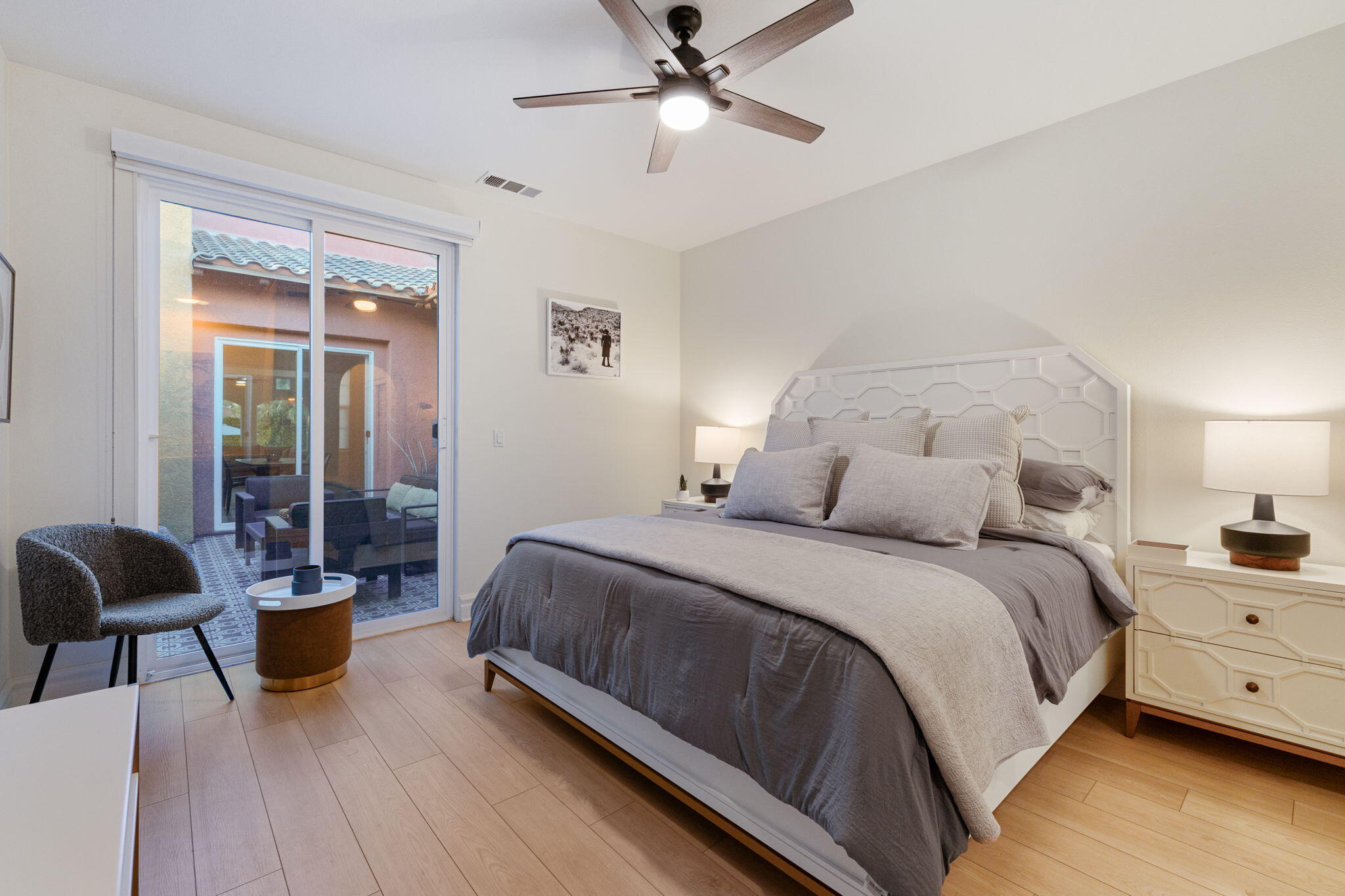 6 Via Santa Ramona Rancho Mirage, CA 92270 - Photo 27 of 60 a bedroom with a bed and wooden floor
