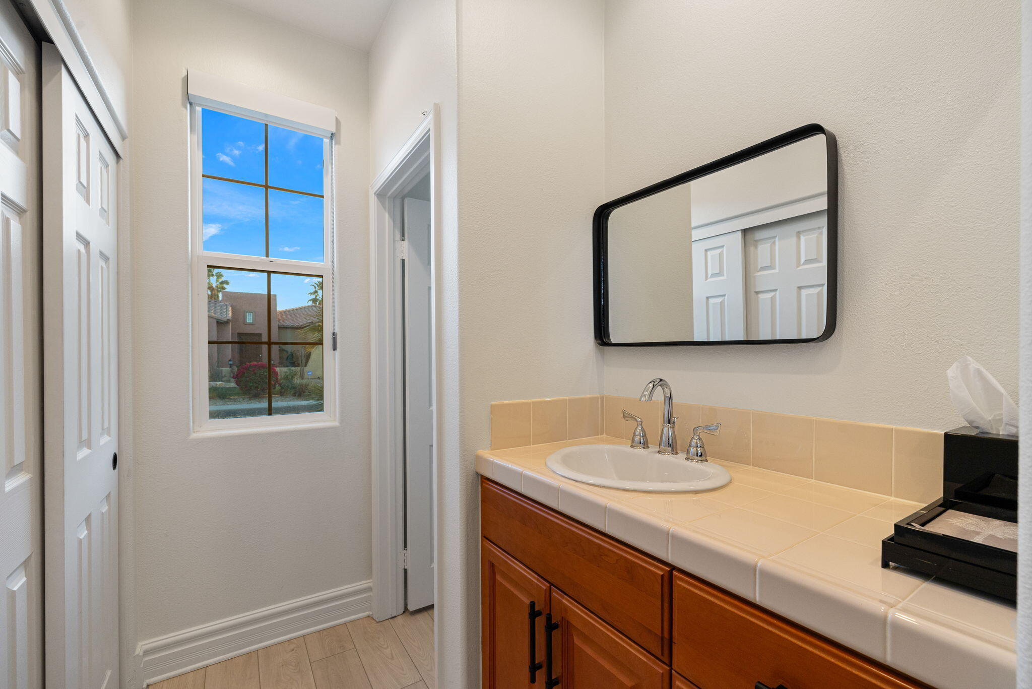 6 Via Santa Ramona Rancho Mirage, CA 92270 - Photo 29 of 60 a bathroom with a sink vanity and a mirror