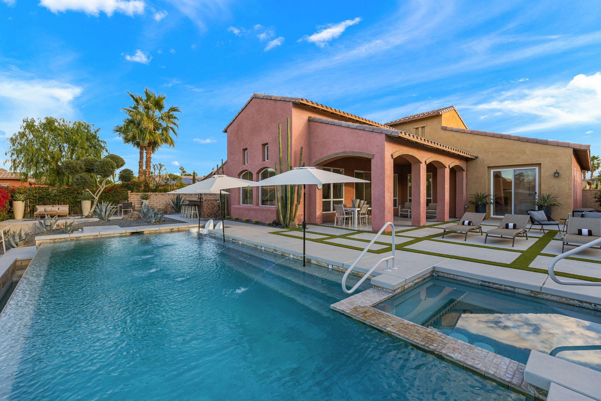 6 Via Santa Ramona Rancho Mirage, CA 92270 - Photo 3 of 60 a view of house with outdoor space and swimming pool