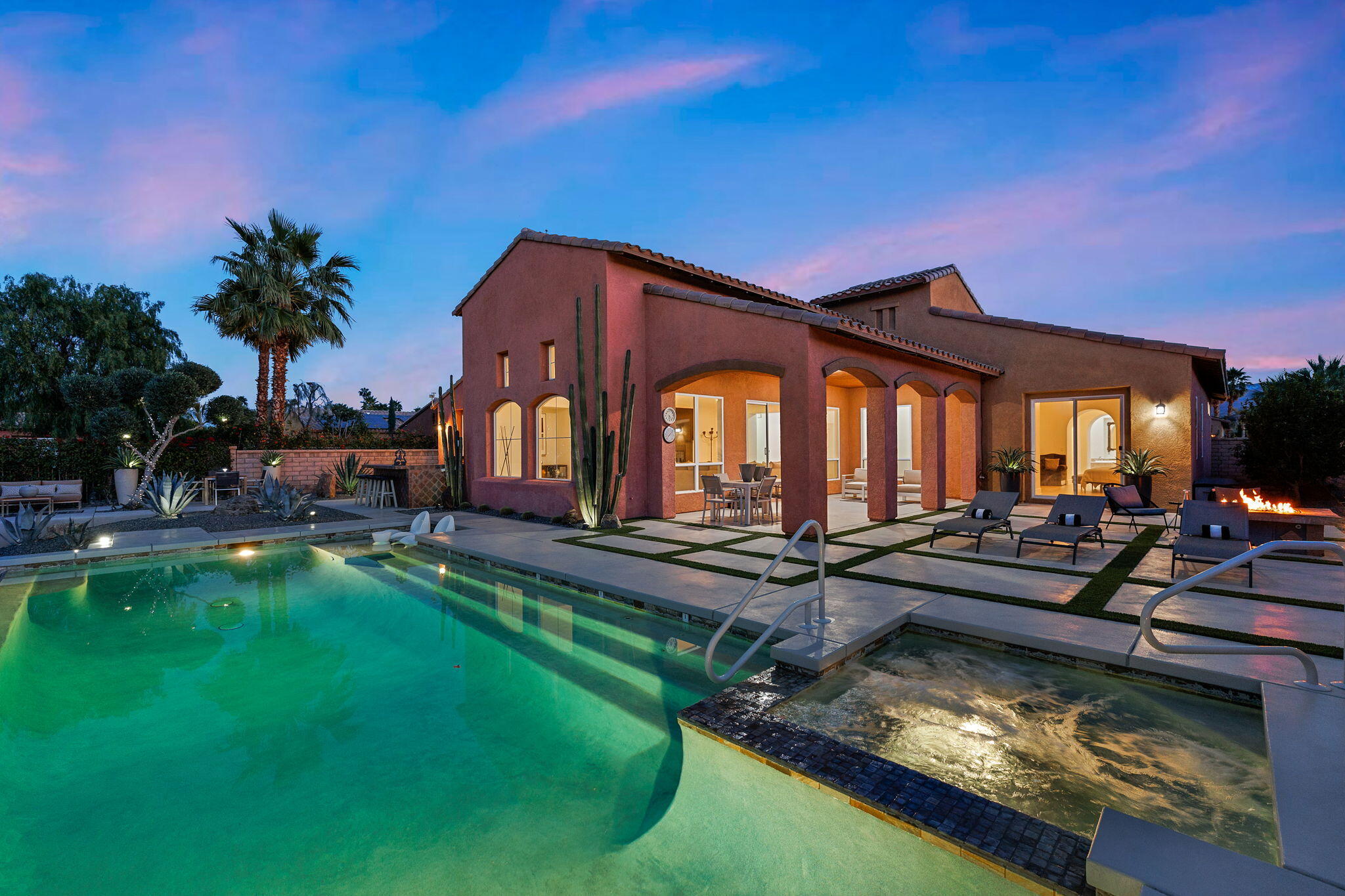 6 Via Santa Ramona Rancho Mirage, CA 92270 - Photo 35 of 60 a view of a house with swimming pool and sitting area