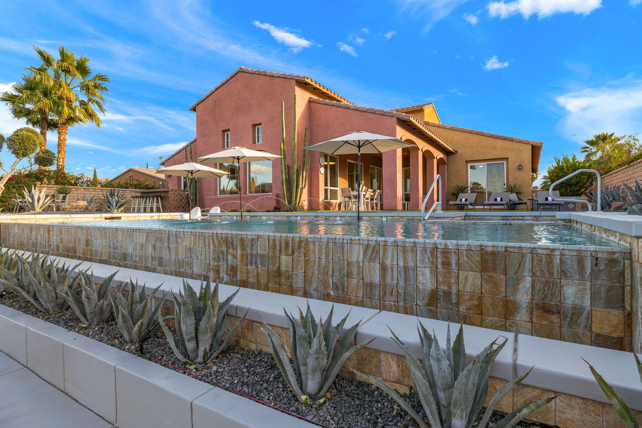 6 Via Santa Ramona Rancho Mirage, CA 92270 - Photo 4 of 60 a view of a house with a balcony next to a lake view