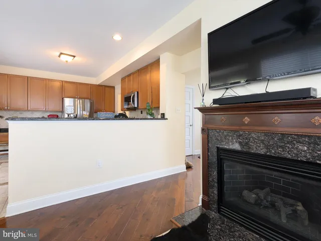 a kitchen with a stove and a microwave