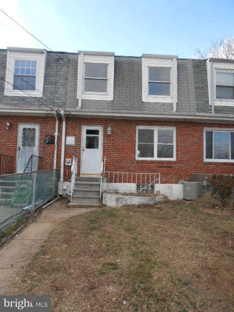 2102 Graythorn Road Middle River, MD 21220 - Photo 9 of 18 a view of a brick house with many windows