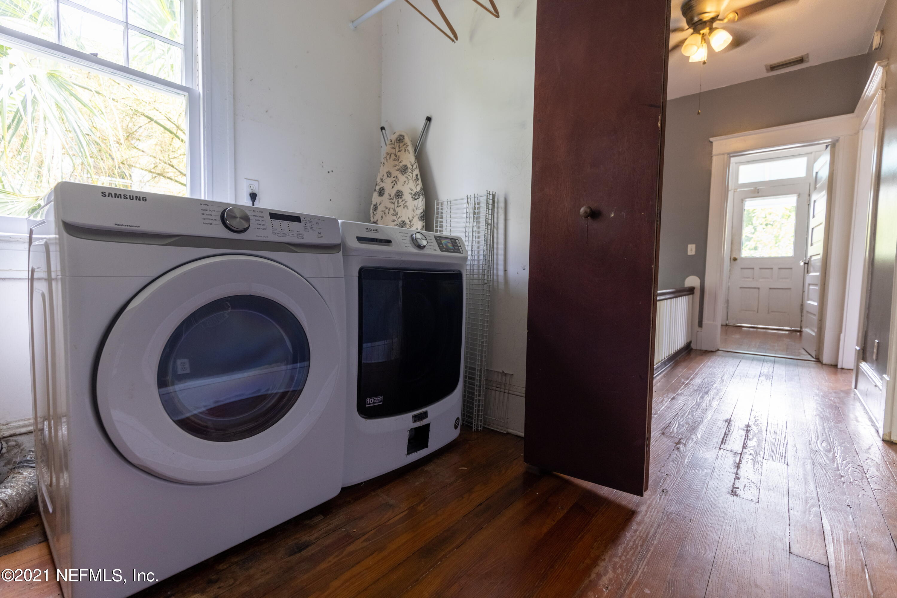 1532 Perry Street Jacksonville, FL 32206 - Photo 20 of 58 a utility room with wooden floor washer and dryer