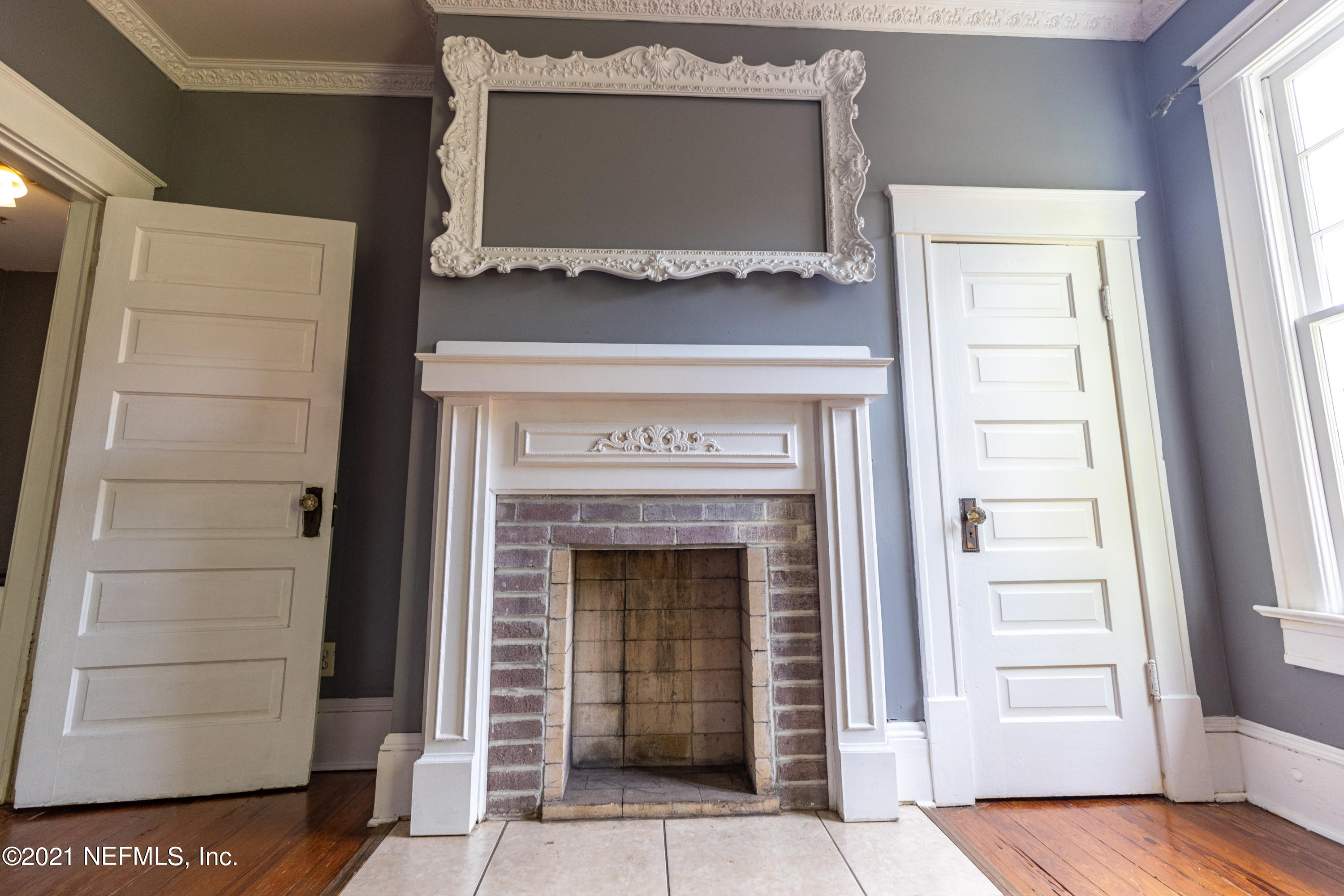 1532 Perry Street Jacksonville, FL 32206 - Photo 26 of 58 a living room with a fireplace