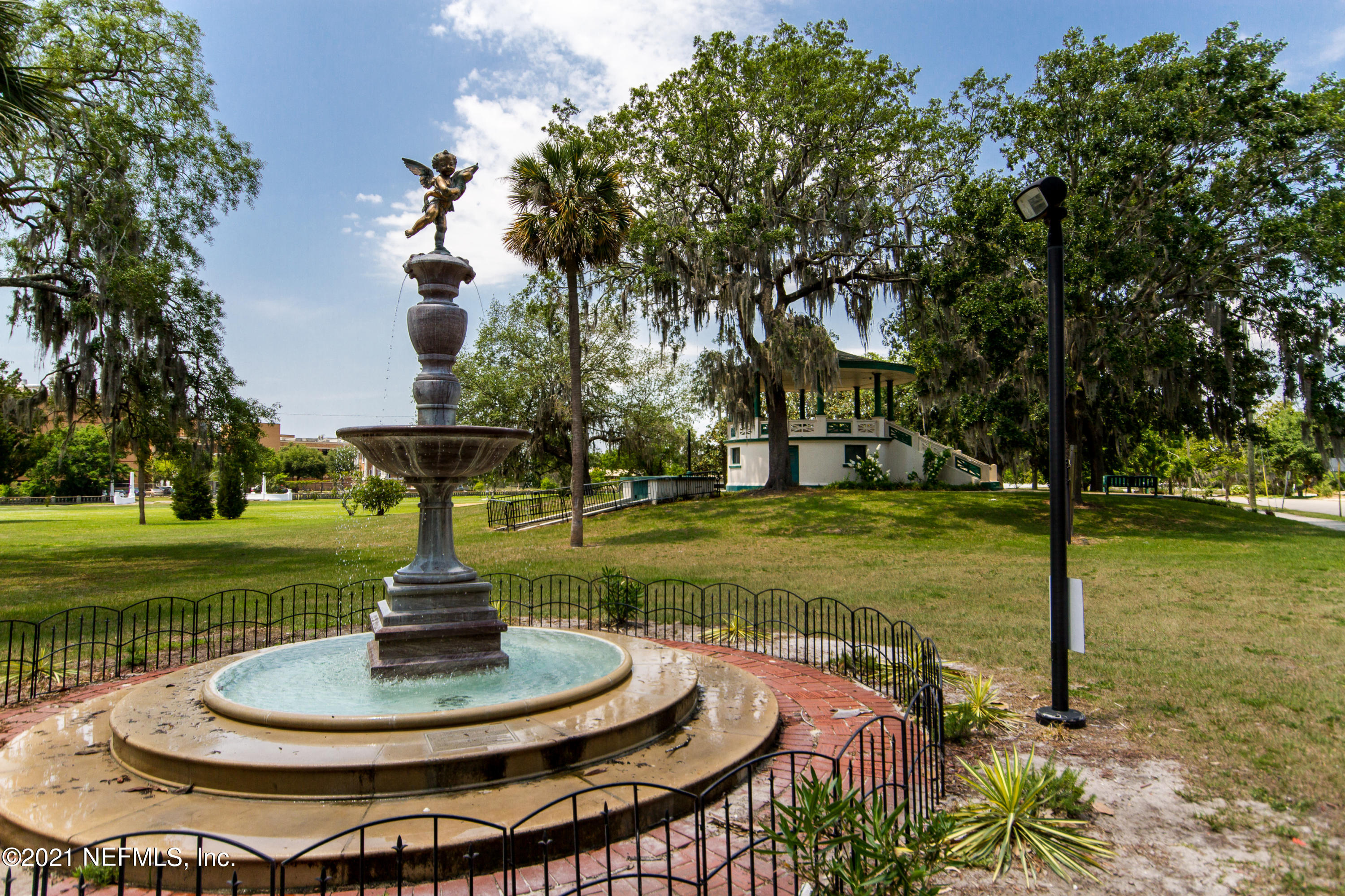 1532 Perry Street Jacksonville, FL 32206 - Photo 54 of 58 a swimming pool with trees in the background