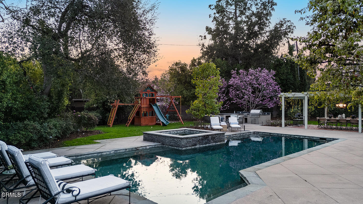 1477 Old Mill Road San Marino, CA 91108 - Photo 3 of 3 a view of a backyard with plants and a patio