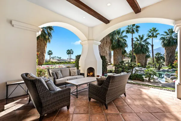 a outdoor living space with furniture and garden view