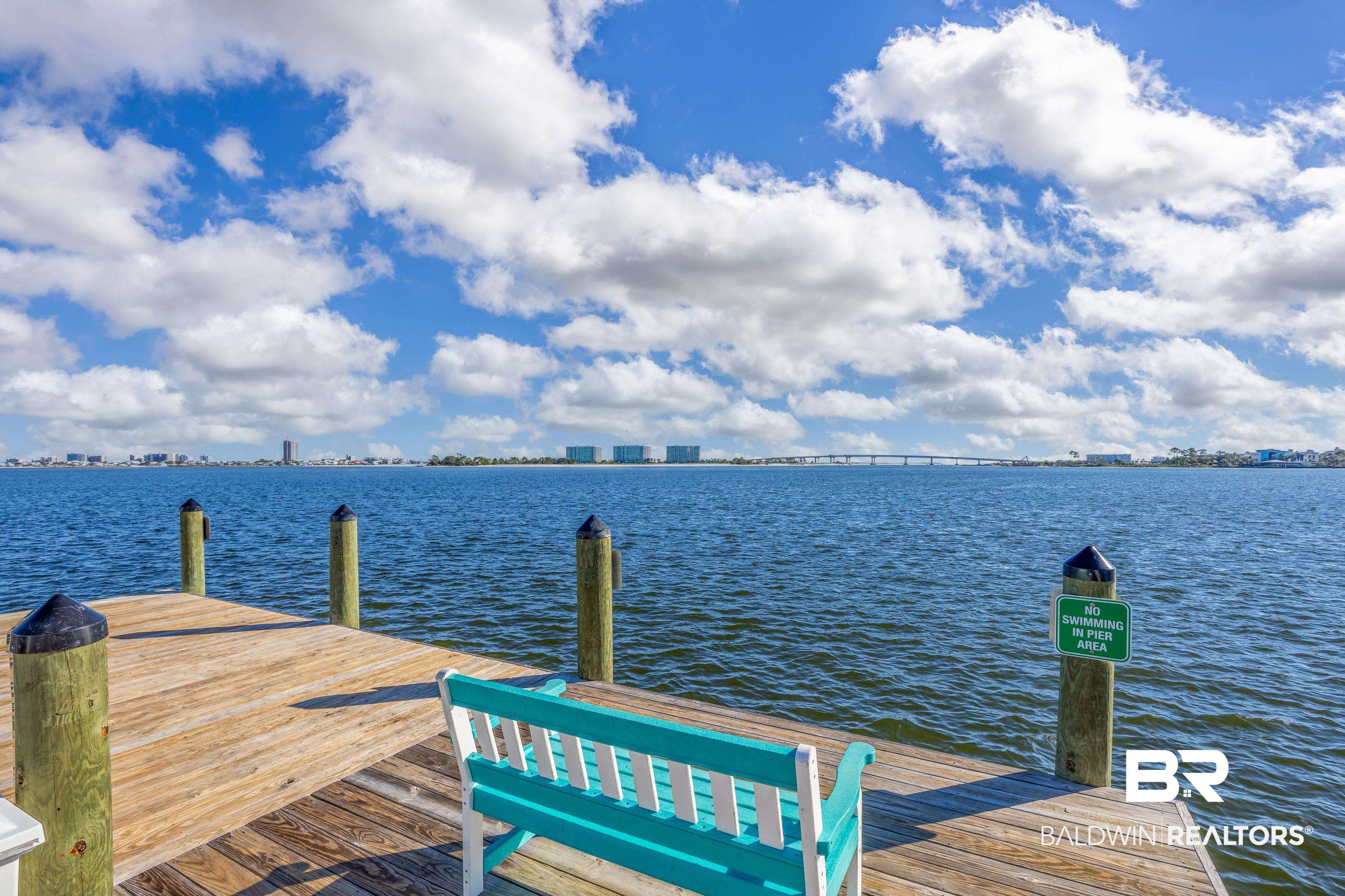 27580 Canal Road, Unit 1431 Orange Beach, AL 36561 - Photo 53 of 73 Dock area with a water view and a skyline view