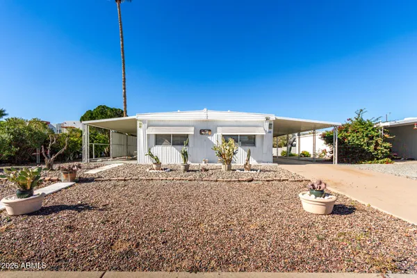 a front view of a house with patio