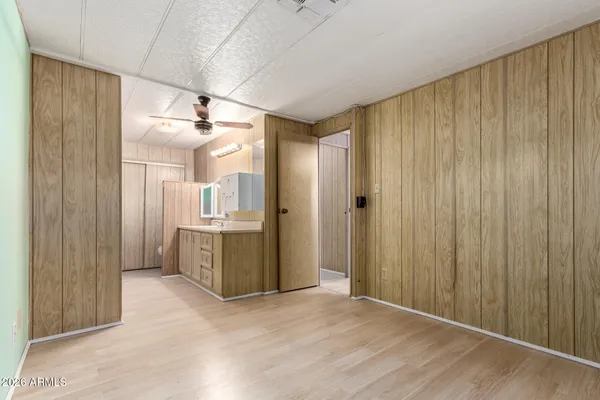 a bathroom with a mirror and a shower