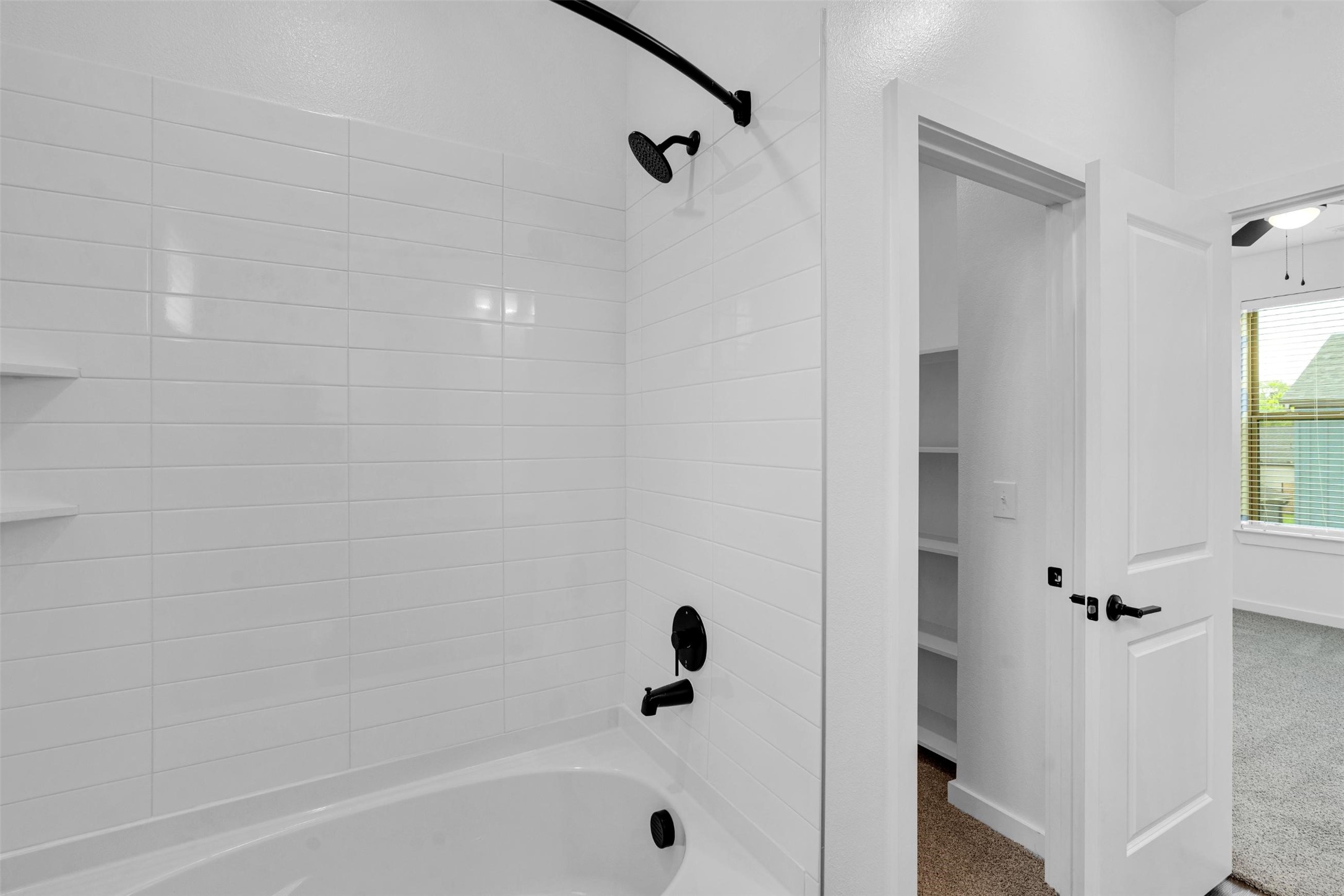 1433 B Soccer Drive Little Elm, TX 75068 - Photo 14 of 38 a bathroom with a bathtub