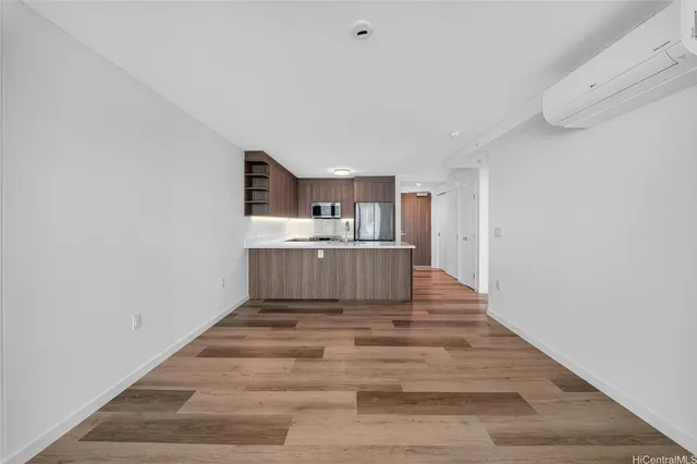 a view of kitchen with wooden floor