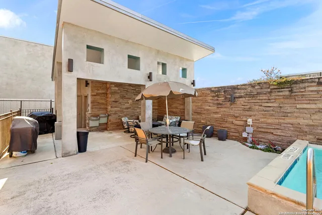 a outdoor space with patio the couches and a stove
