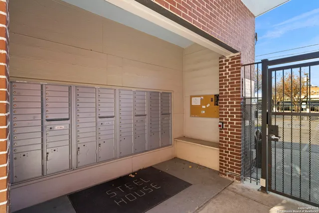 a view of a building with sitting area