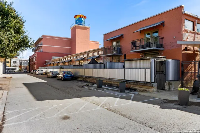 an aerial view of multi story residential apartment building