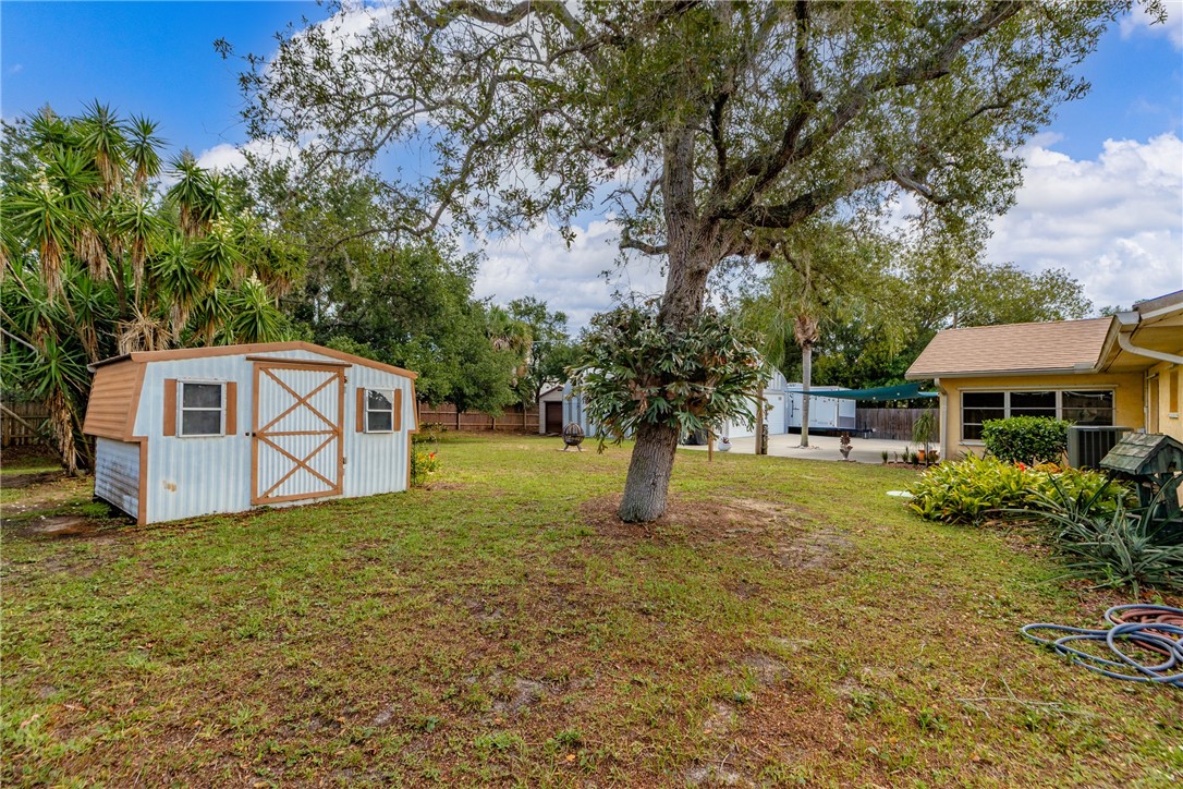 7666 134th Street Sebastian, FL 32958 - Photo 28 of 35 a house view with a garden space