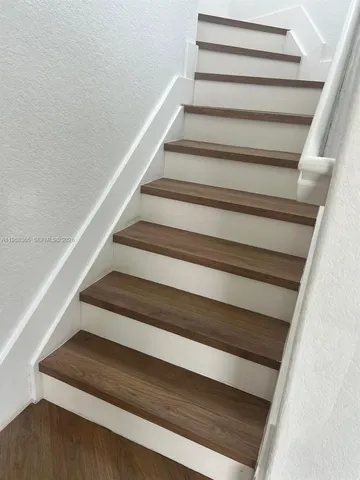 a kitchen with a stove and cabinets