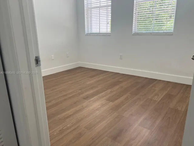 a refrigerator freezer sitting inside of a kitchen