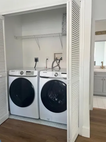 a utility room with dryer and washer