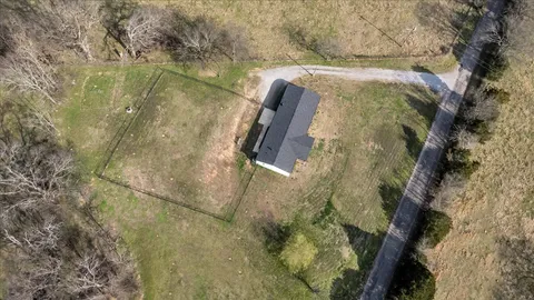 a view of a town with mountains in the background