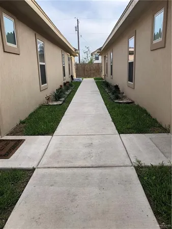 a view of backyard of the house
