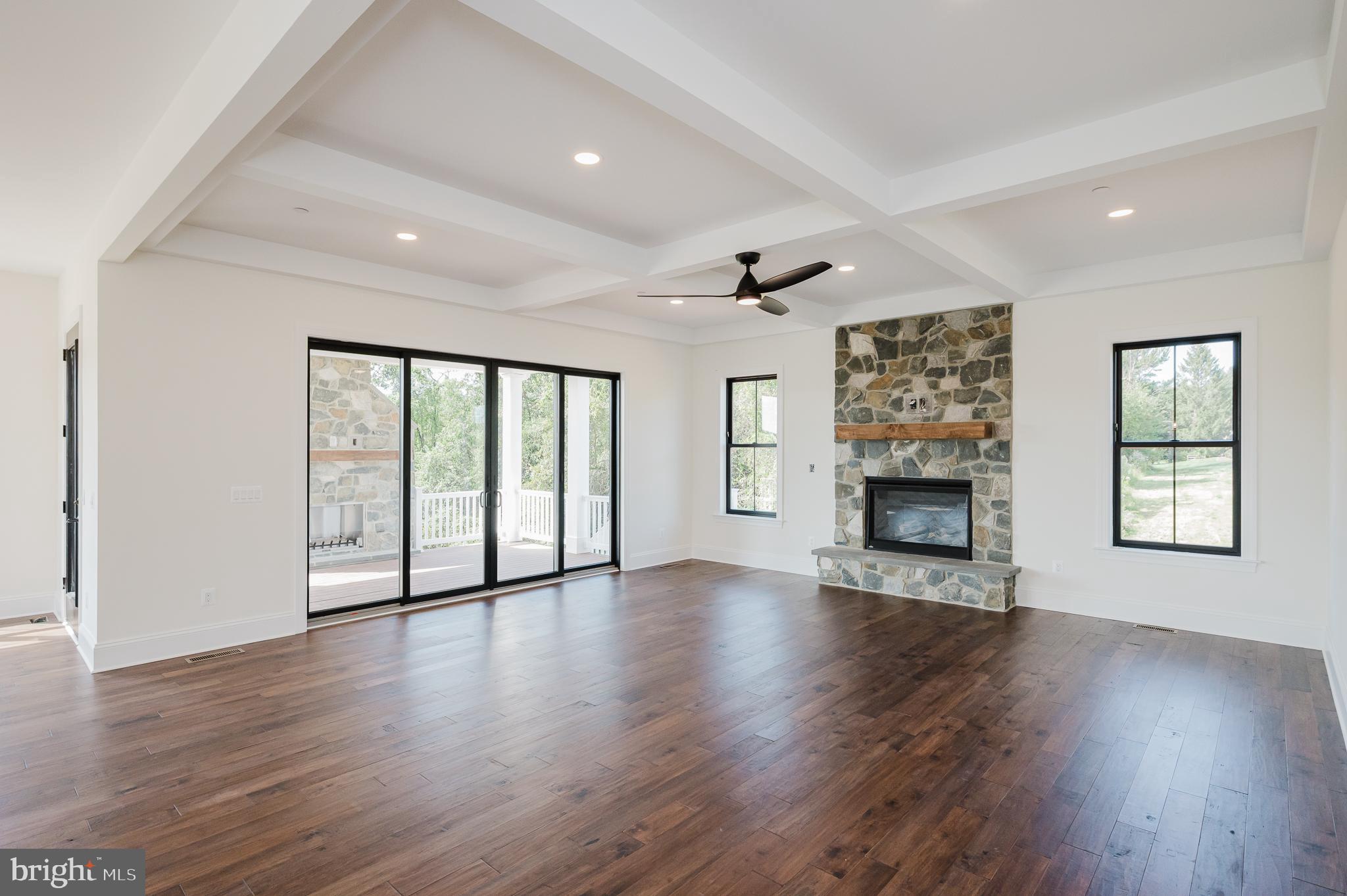 1709 Laurel Brook Road Fallston, MD 21047 - Photo 12 of 83 a view of an empty room with wooden floor and a window