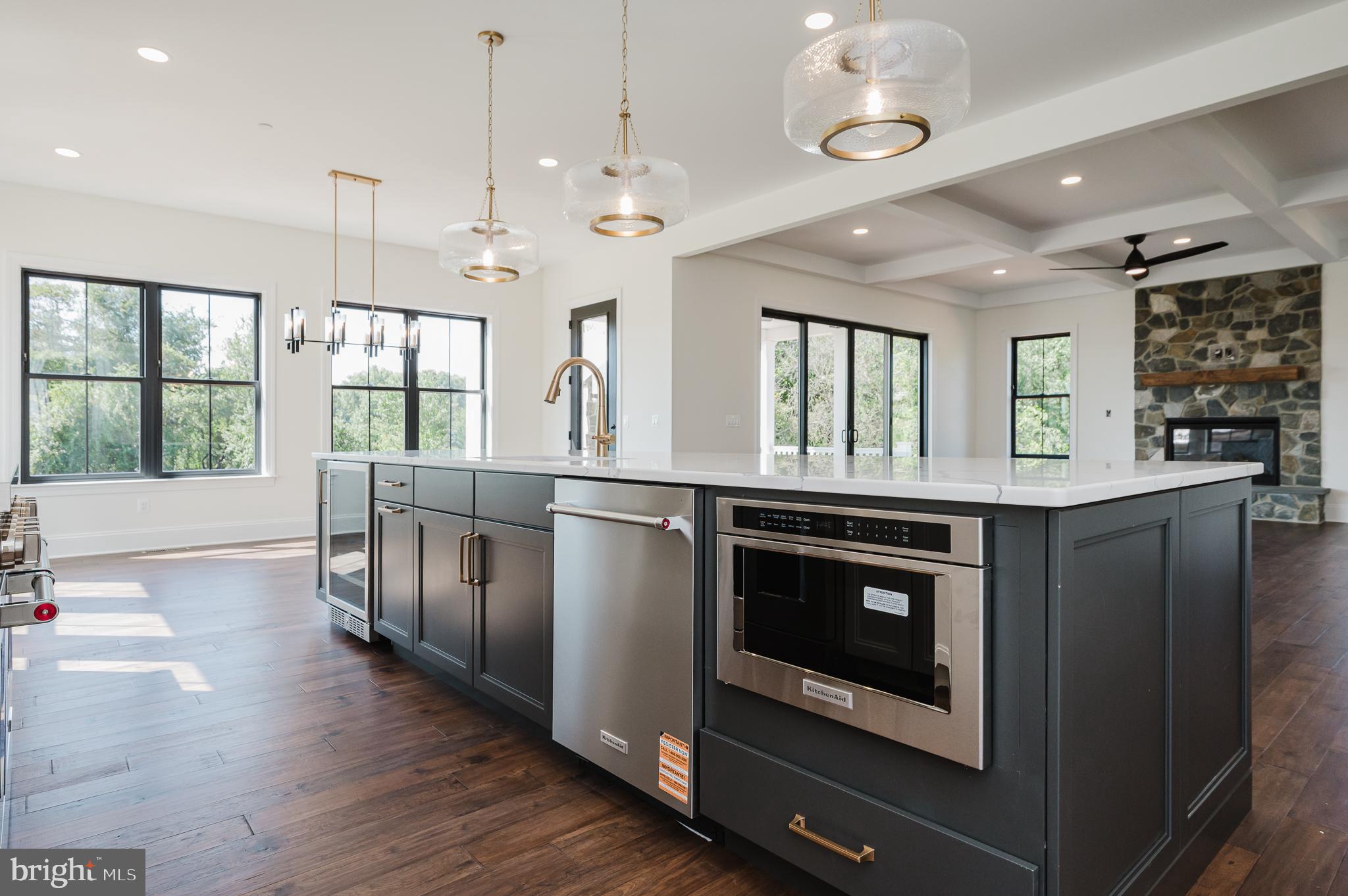 1709 Laurel Brook Road Fallston, MD 21047 - Photo 19 of 83 a kitchen with stainless steel appliances granite countertop a stove and cabinets