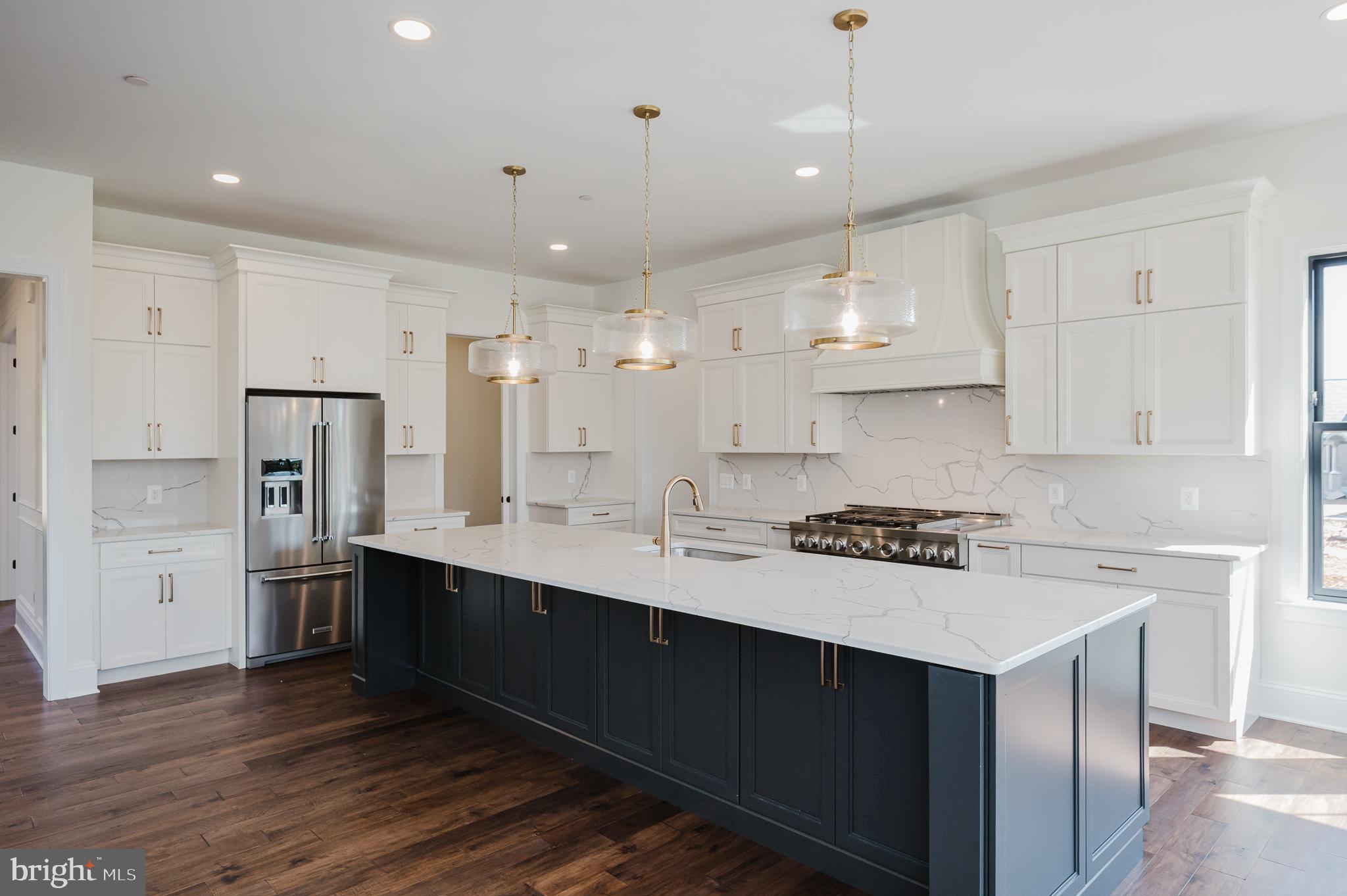 1709 Laurel Brook Road Fallston, MD 21047 - Photo 26 of 83 a kitchen with stainless steel appliances a sink stove and refrigerator
