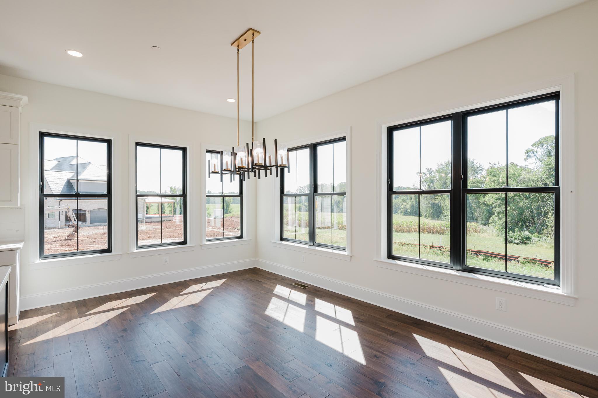 1709 Laurel Brook Road Fallston, MD 21047 - Photo 28 of 83 a view of an empty room with wooden floor and a window