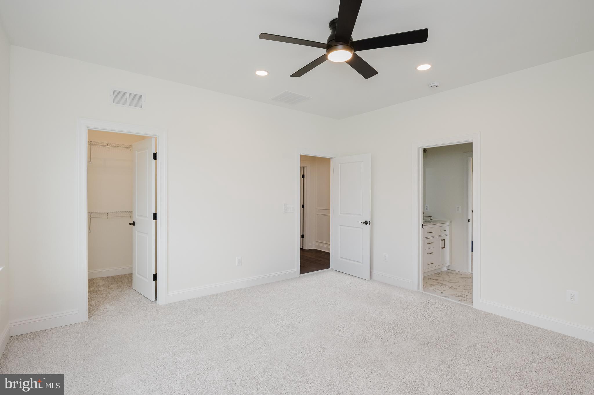 1709 Laurel Brook Road Fallston, MD 21047 - Photo 48 of 83 a view of a livingroom with a ceiling fan & a ceiling fan