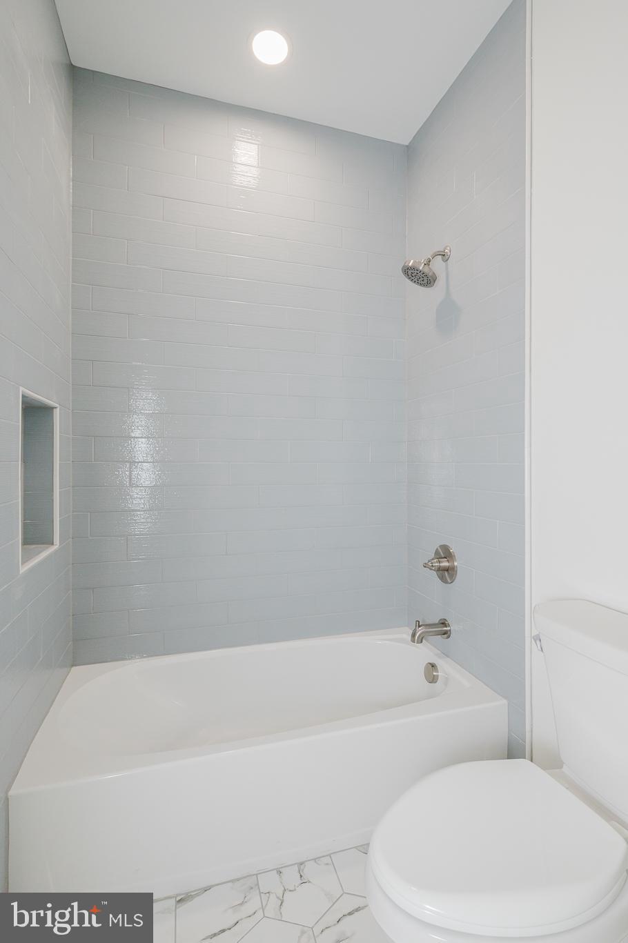 1709 Laurel Brook Road Fallston, MD 21047 - Photo 51 of 83 a white bath tub sitting next to a white toilet