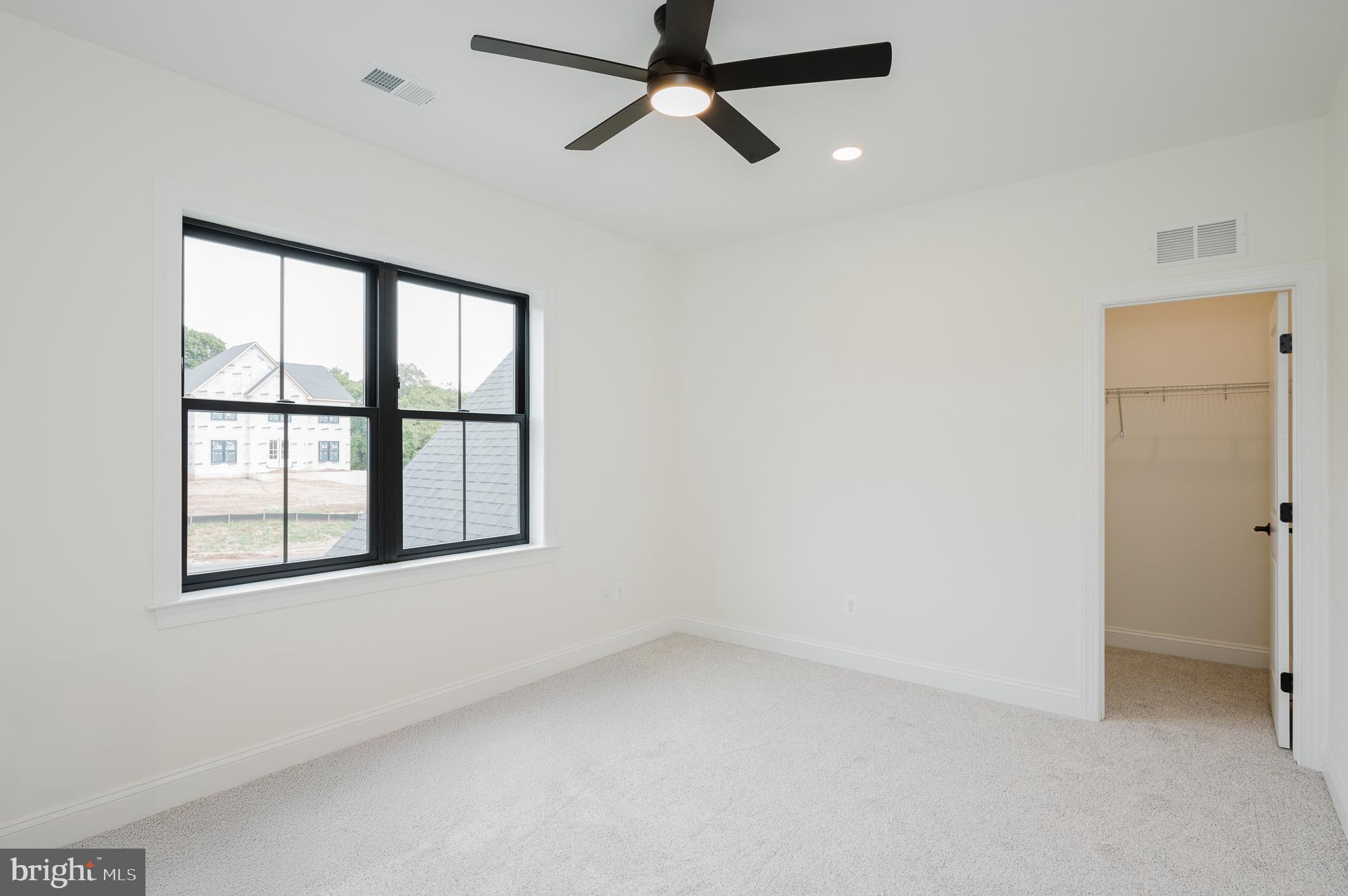 1709 Laurel Brook Road Fallston, MD 21047 - Photo 56 of 83 an empty room with a window and a fan