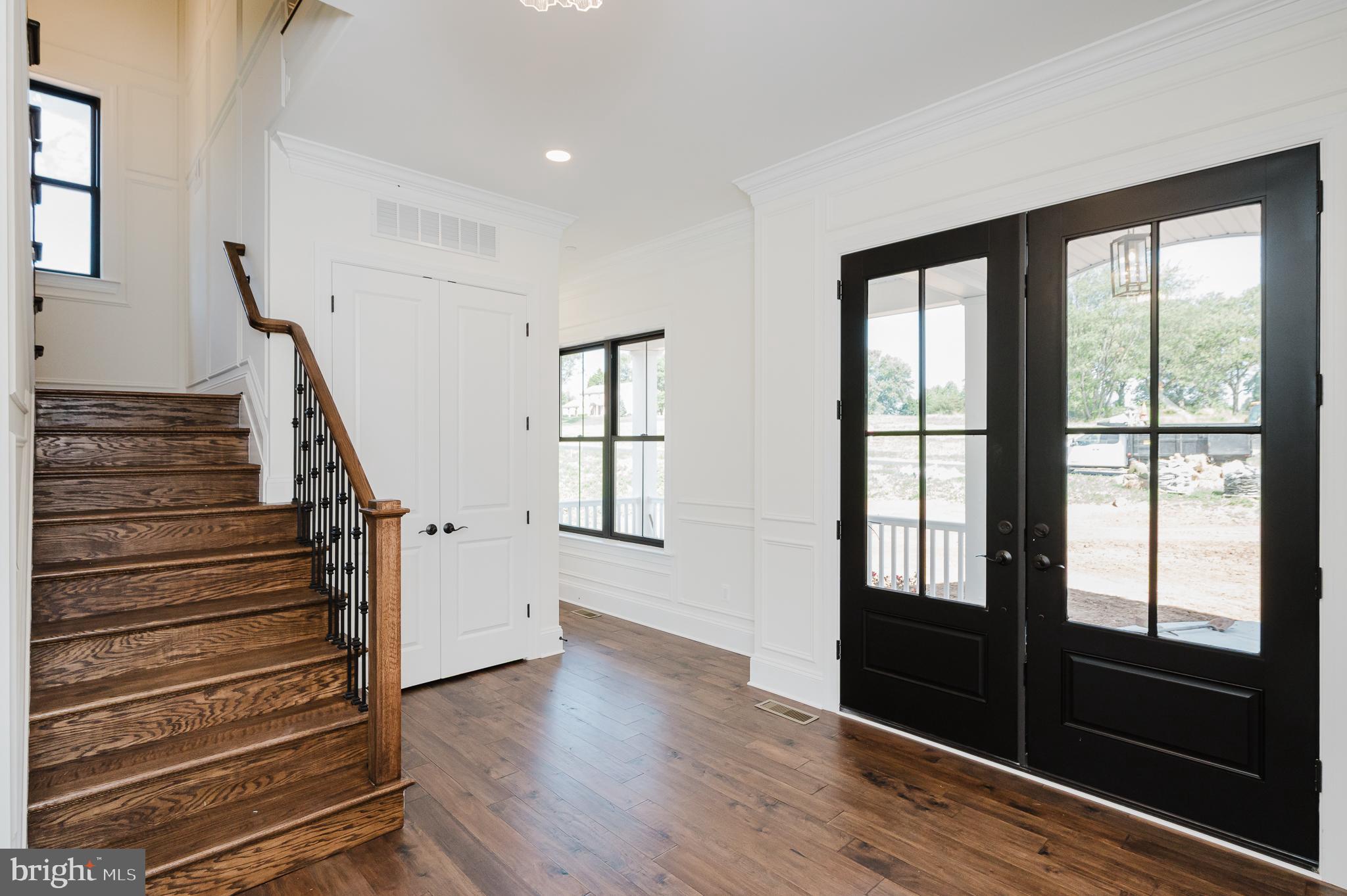 1709 Laurel Brook Road Fallston, MD 21047 - Photo 6 of 83 a view of entryway with stairs and wooden floor