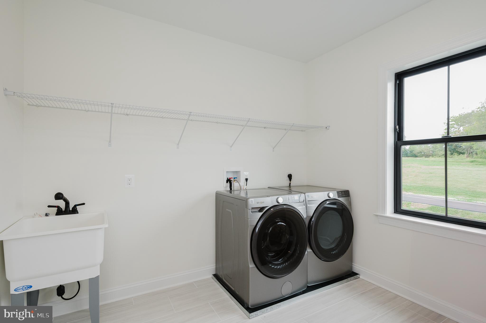 1709 Laurel Brook Road Fallston, MD 21047 - Photo 61 of 83 a utility room with dryer and washer