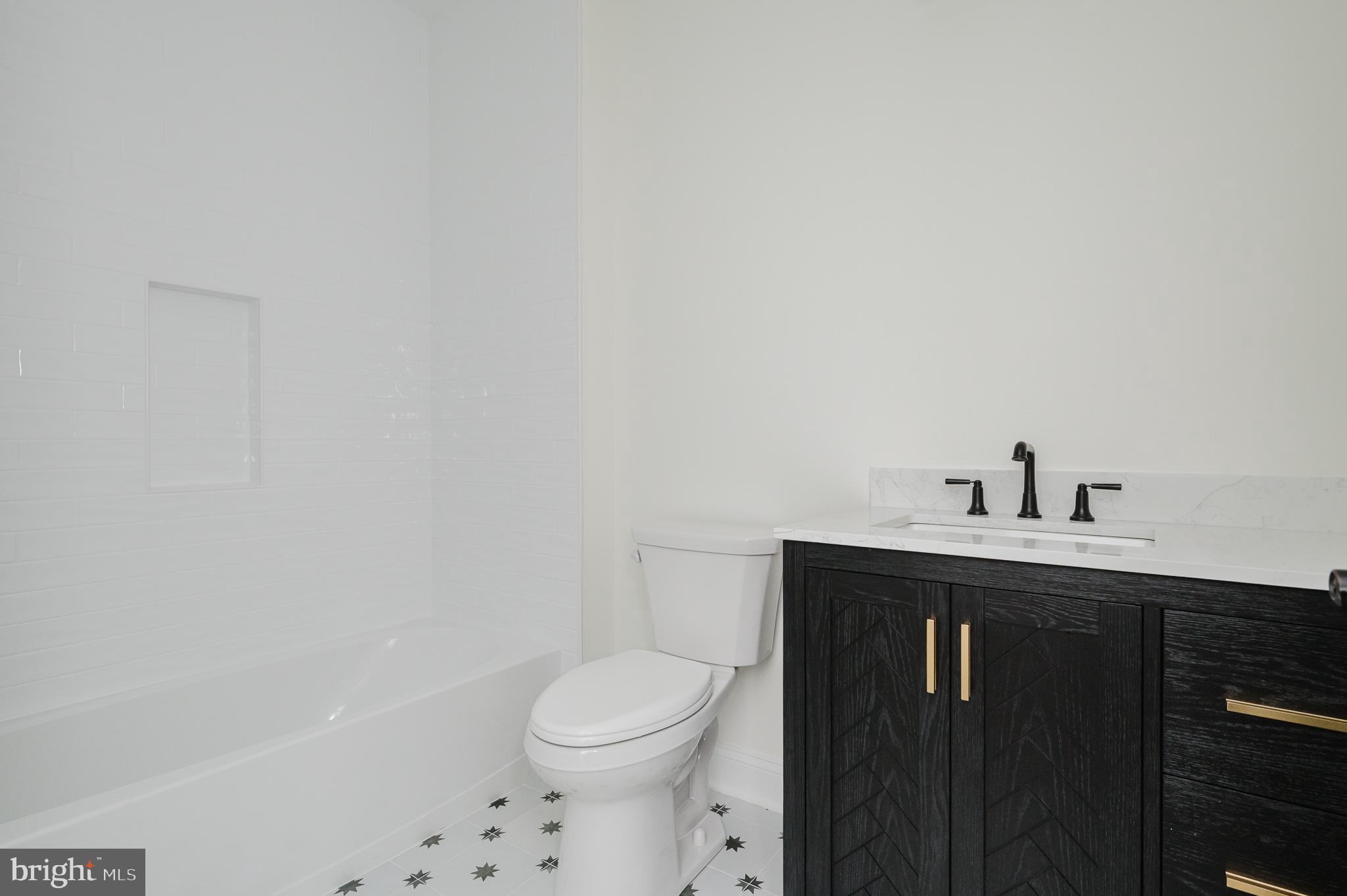 1709 Laurel Brook Road Fallston, MD 21047 - Photo 72 of 83 a bathroom with a sink toilet and vanity