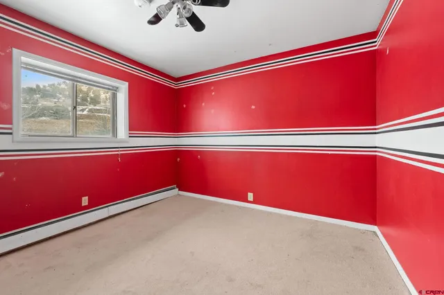 an empty room with windows