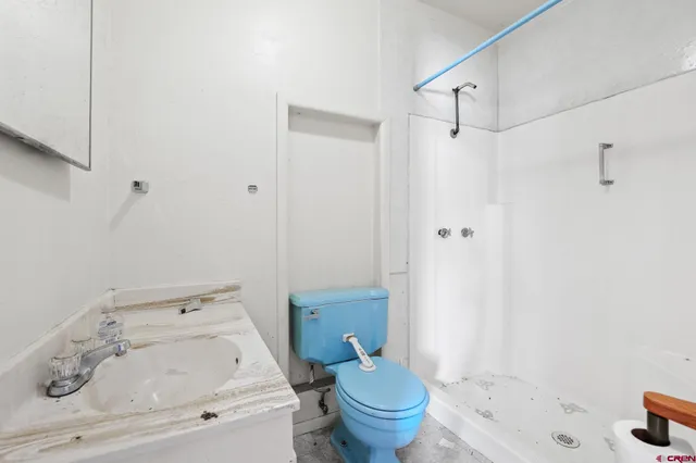 a bathroom with a sink and a toilet