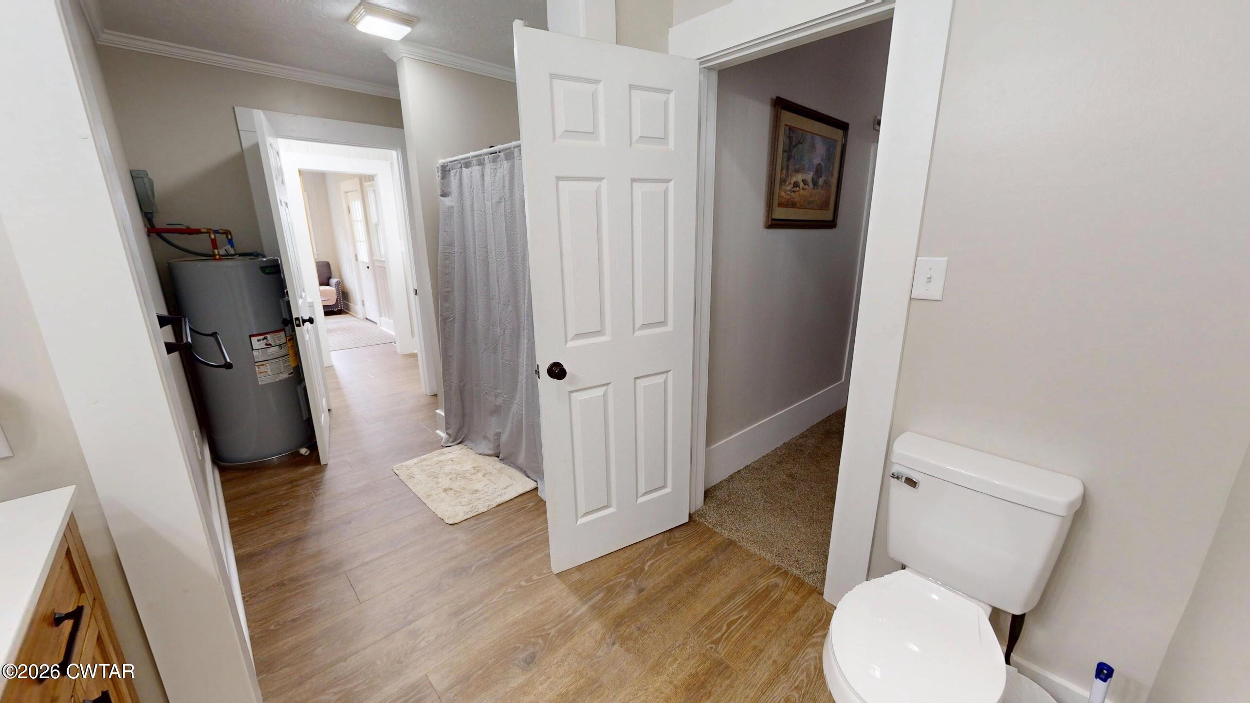 2800 Locust Grove Road Newbern, TN 38059 - Photo 26 of 46 a bathroom with a toilet and a shower