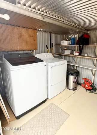 a utility room with dryer and washer