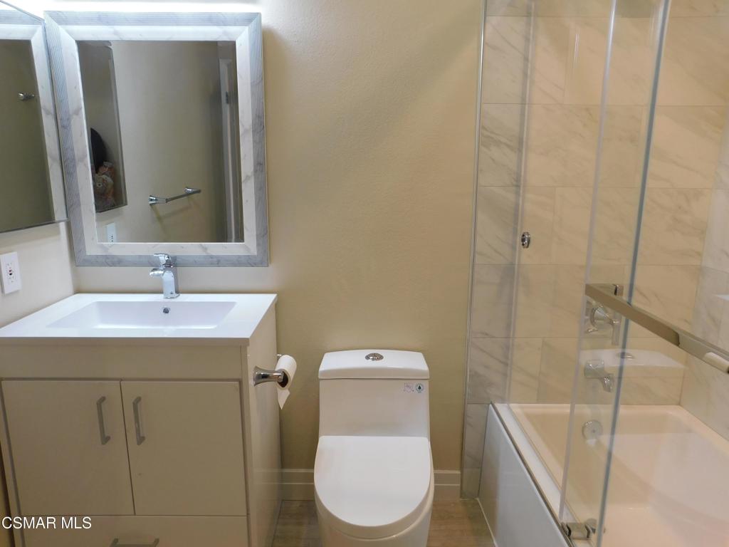 116 Maegan Place, Unit 11 Thousand Oaks, CA 91362 - Photo 21 of 35 a bathroom with a sink a toilet and shower