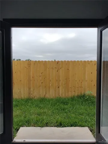 a view of backyard with barn