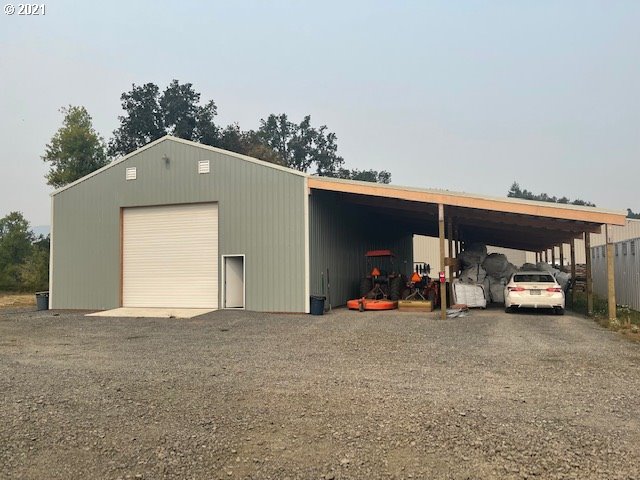 1021 Upper Camas Road Camas Valley, OR 97416 - Photo 12 of 27 a view of a car garage