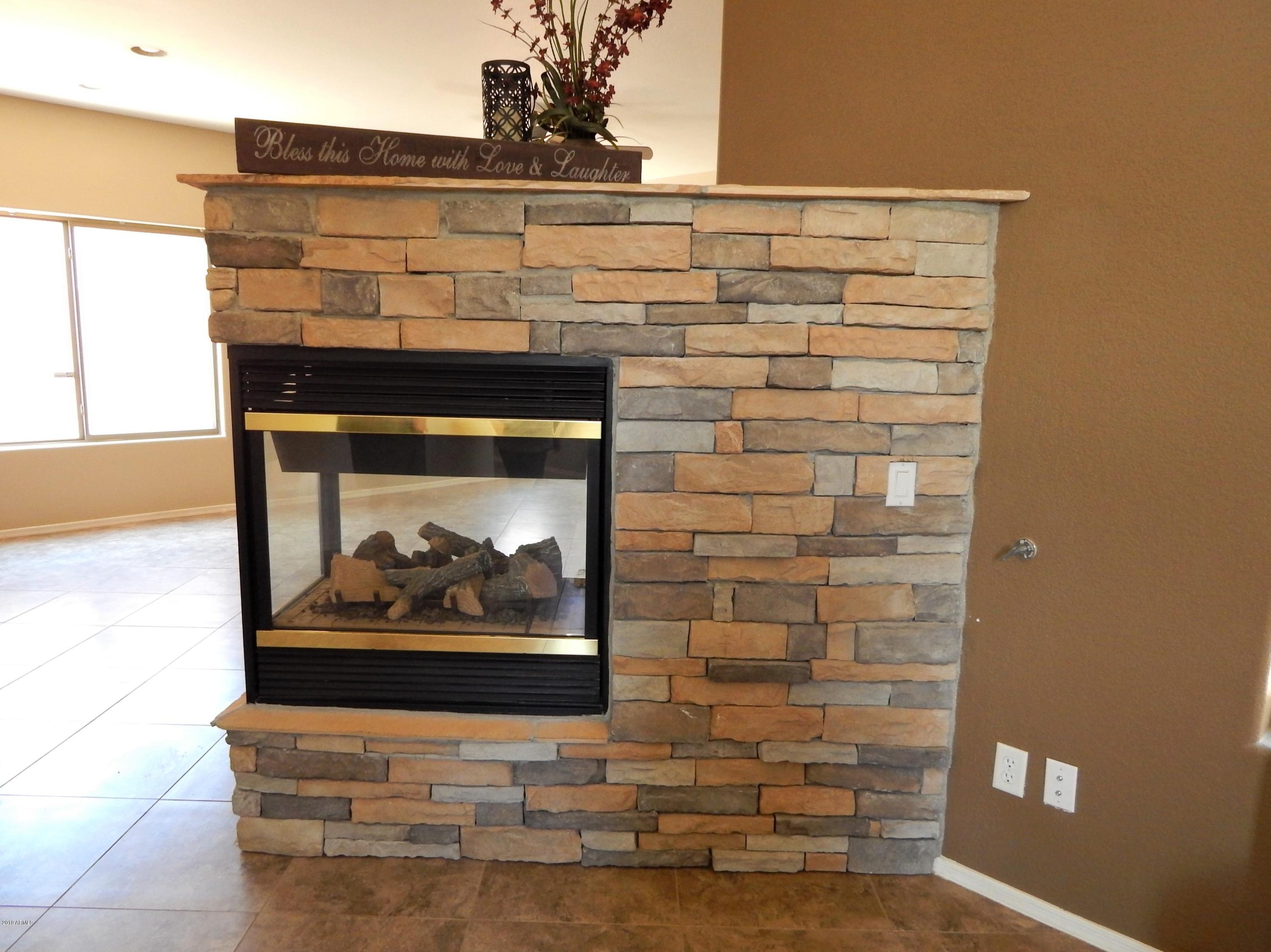 4008 East Ironhorse Road Gilbert, AZ 85297 - Photo 14 of 23 2-3 Way Stone Frieplace