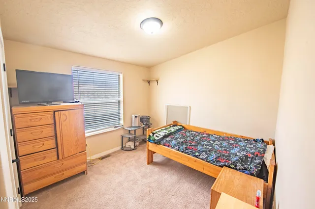 a view of a hallway with a window