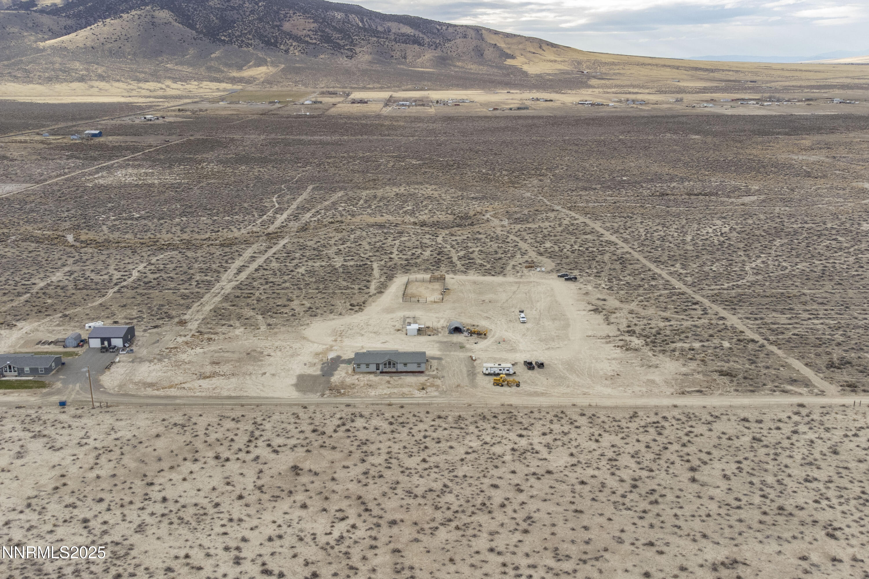 3139 Muddy Road Winnemucca, NV 89445 - Photo 3 of 46 a view of a refrigerator with wooden floor