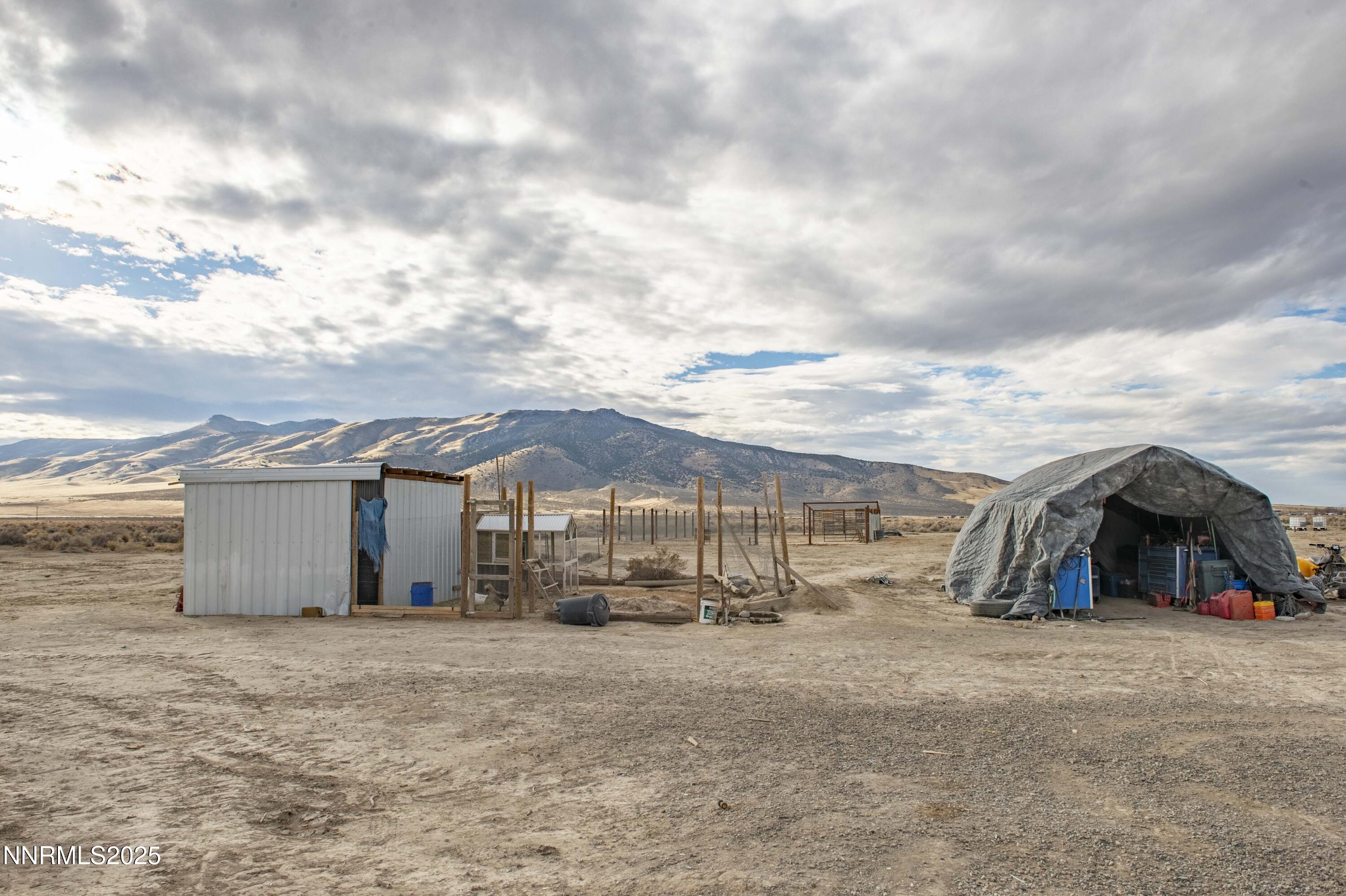 3139 Muddy Road Winnemucca, NV 89445 - Photo 40 of 46 a view of a house with cars parked in front of it