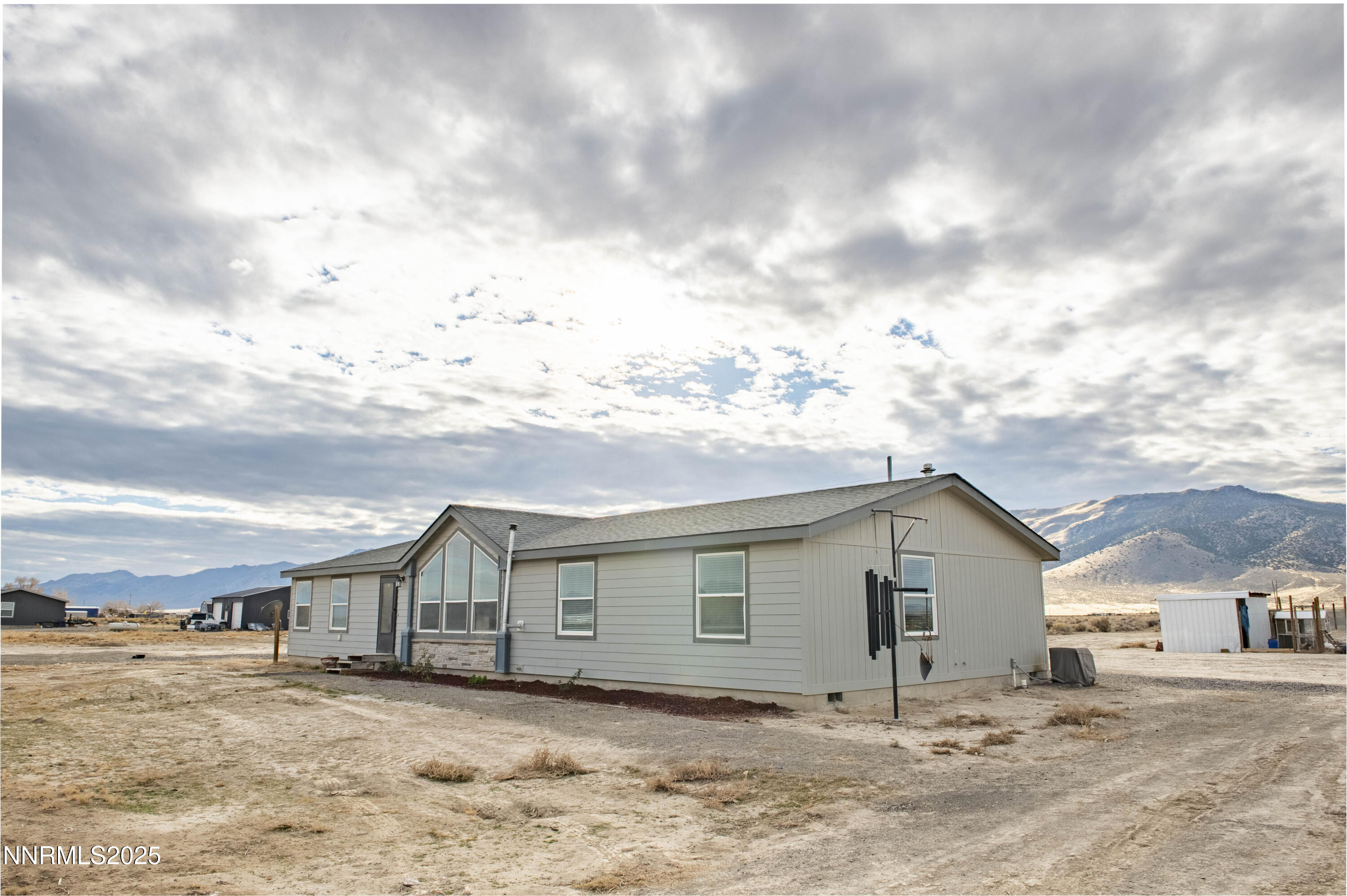3139 Muddy Road Winnemucca, NV 89445 - Photo 43 of 46 a view of a house with a yard