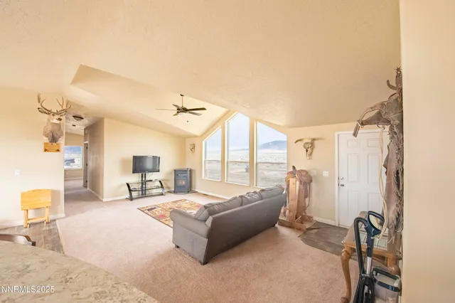 a spacious bathroom with a tub sink and a mirror