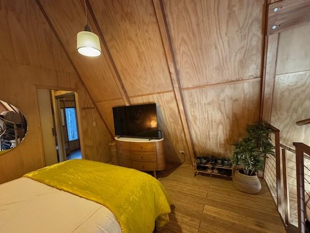 10 Beasore Road Bass Lake, CA 93604 - Photo 7 of 15 a bedroom with a bed and a flat screen tv